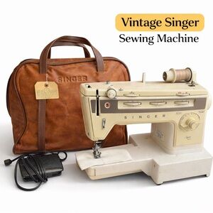 Singer Sewing Machine with Brown Carrying Case